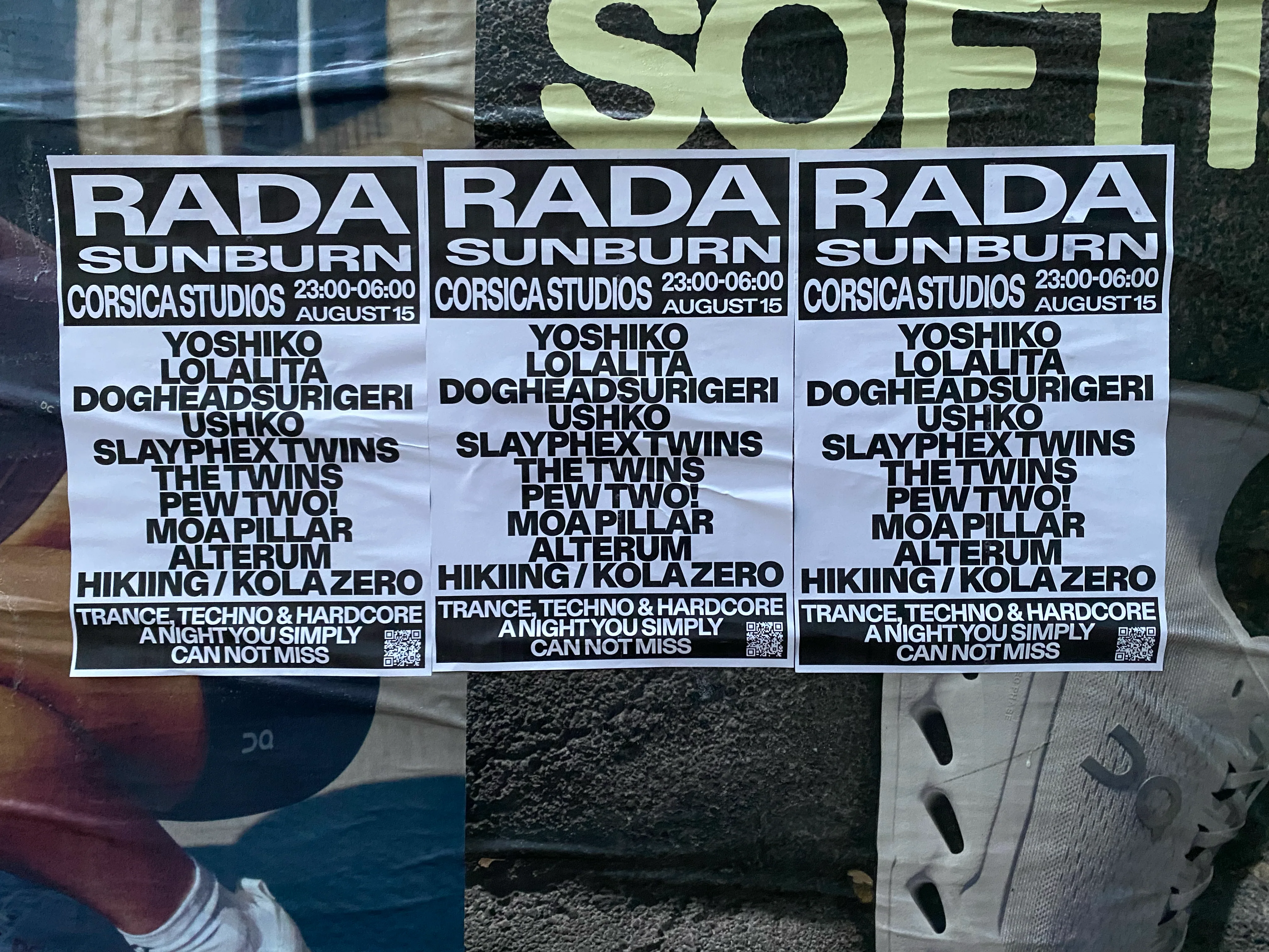 Three posters flyposted over a billboard.